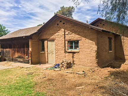 The ghostly remains of an old adobe brick home near Aztec Arizona